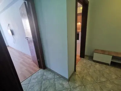 a hallway with a door leading into a room at Апартамент ЛаХабана до плажа в Поморие in Pomorie