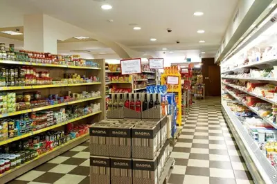 a store aisle of a grocery store with lots of products at Santa Marina, Lovely 1-bedroom apartment in Sozopol