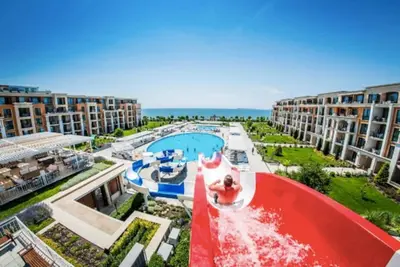 an aerial view of a resort with a pool at Premier Fort Apartment on Seafront in Sveti Vlas
