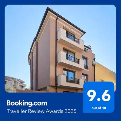 a picture of a building with the words travel review awards at Bendita House in Pomorie