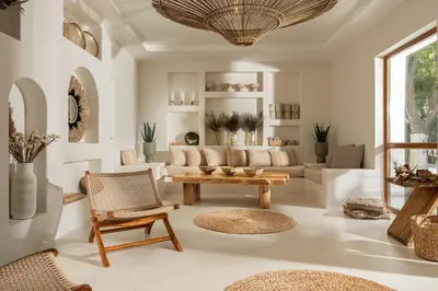 a living room with a couch and a table at PARADISE Bay Hotel in Sozopol