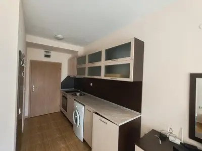 a kitchen with a sink and a washer and dryer at Magic Dreams Apartments in Sveti Vlas