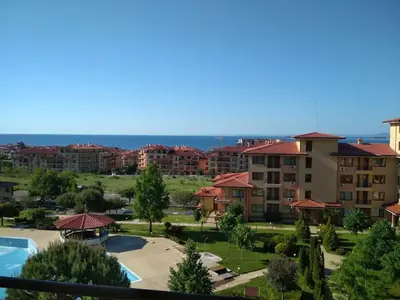 a view of a resort with a pool and buildings at Magic Dreams Apartments in Sveti Vlas