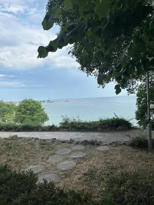 a view of the ocean from a park at Seaside Apartment Nesebar in Nesebar