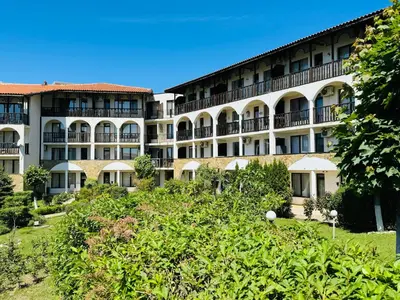 a large building with balconies on the side of it at VODENICATA 4-10 Apartment Sveti Vlas in Sveti Vlas