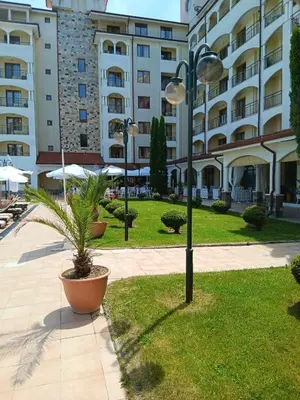 a street light in front of a large building at Sunrise apartment 2 bedrooms in Obzor