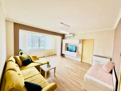 a living room with a couch and a tv at 