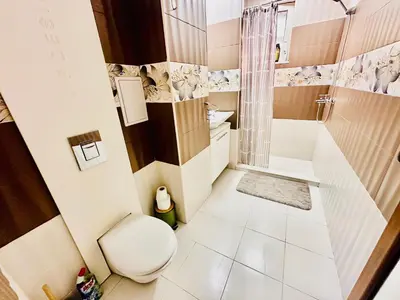 a bathroom with a toilet and a shower at 