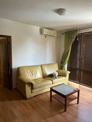 a living room with a couch and a coffee table at Tania's Home in Sunny Beach