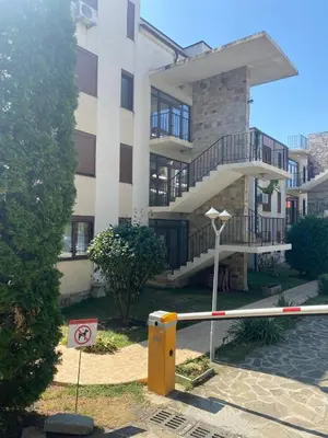 a building with a no parking sign in front of it at Dolce Vita Premium Apartment Panorama Sea View in Sveti Vlas