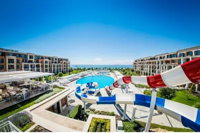 a view of a water slide at a resort at Premier Lux apartmán in Sveti Vlas