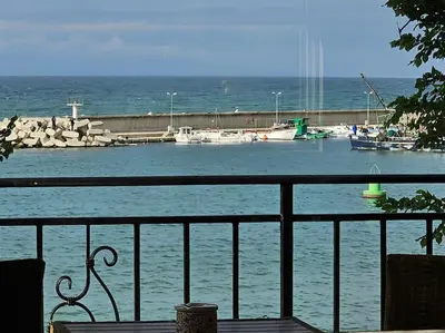 a view of a marina with boats in the water at Apartment Porto Chernomoretz in Chernomorets
