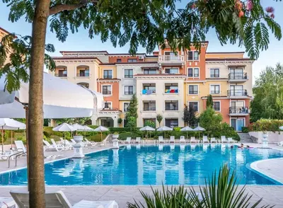a swimming pool in front of a building at Marteo Apartments103 - Sozopol in Sozopol