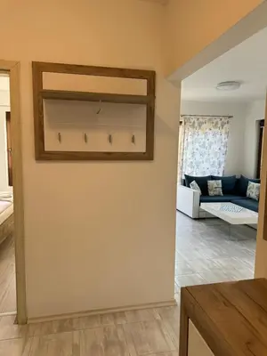 a living room with a wall with a built in shelf at Marteo Apartments103 - Sozopol in Sozopol
