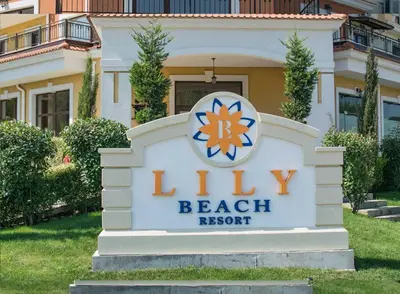 a sign for a beach resort in front of a house at Marteo Apartments103 - Sozopol in Sozopol