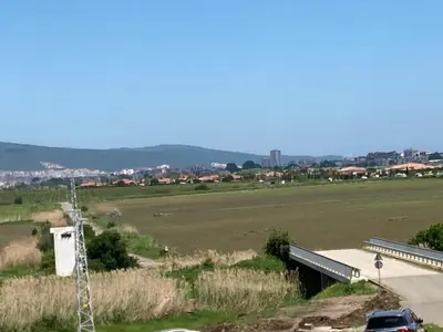 a view of a highway with a bridge and a field at Brymonte Studio, Sunny Day 6 in Tŭnkovo