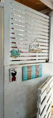 a wall with signs on the side of a building at каравана ТРОПИК-ЕКЗОТИК А 17 in Sozopol