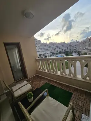 a balcony with a view of a building at South Bay Apartment - Varna in Varna City