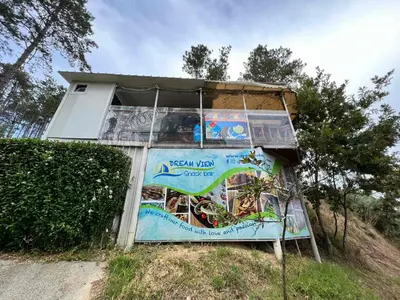 a house with a sign in front of it at Double studio Petra B2-5 in Byala