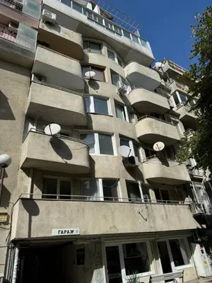 a large building with balconies on the side of it at Sea Treasure in Varna City