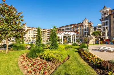a park in front of a large building at Royal Sun - Premium Apartments in Sunny Beach