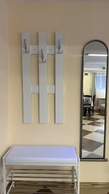 a dressing room with a mirror and a dressing table at Spacious Apartment in Central Burgas in Burgas City