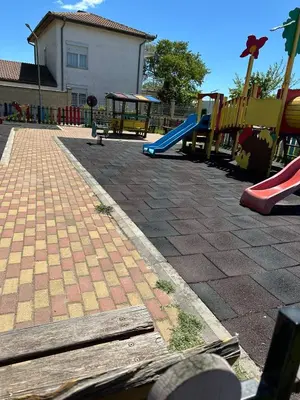 a playground with a slide and a slideintend at Victoria in Varna City