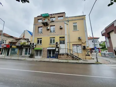 a building on the side of a city street at Mateo Center in Varna City