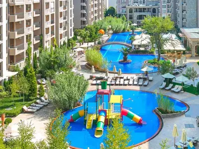 an aerial view of a water park with a water slide at Студия в лучшем комплексе на Солнечном берегу in Sunny Beach