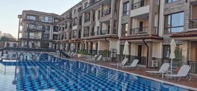 a swimming pool in the middle of a building at Aх, морето in Burgas City