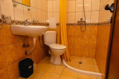 a bathroom with a sink and a toilet and a shower at Studio in the Center of Sunny Beach by Flat Mаnаger in Sunny Beach