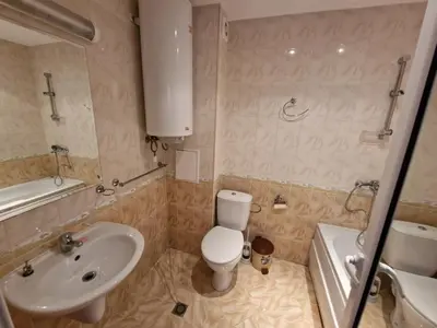 a bathroom with a white toilet and a sink at the magic dream, Sveti Vlas in Sveti Vlas