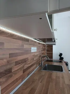 a kitchen with a sink and a wooden counter top at Sun Holidays Byala in Byala
