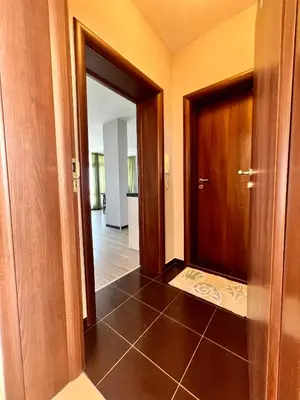a hallway with two doors and a tile floor at Vista Sul Mare V in Kraymorie