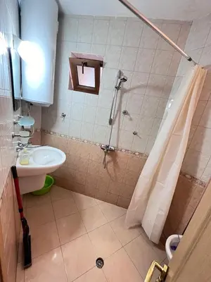 a bathroom with a shower and a sink at Apartment Divna in Sozopol