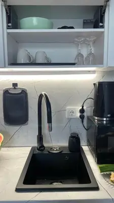 a kitchen counter with a sink in a kitchen at Mint Casa Rossa in Sunny Beach