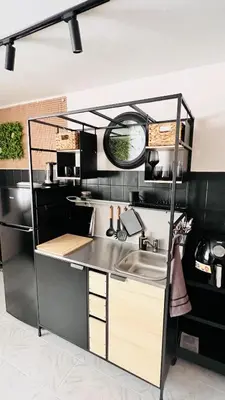 a kitchen with a sink and a counter at Apartment Blue Summer II in Varna City