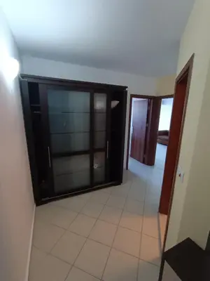 a living room with a large glass door at Oasis beach house , apartment Nevena in Lozenets