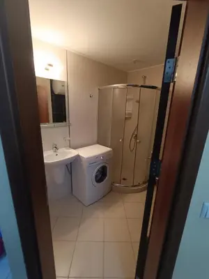 a bathroom with a toilet sink and a shower at Oasis beach house , apartment Nevena in Lozenets