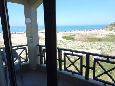 a view of the beach from the balcony of a beach house at Oasis Beach 2 bedroom apartment in Lozenets