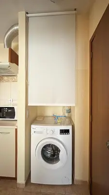 a kitchen with a washing machine in a kitchen at One bedroom Apartment in Sunny Beach