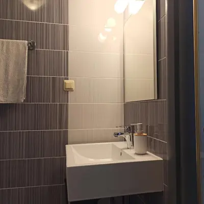 a bathroom with a sink and a mirror at Dolce Vita 1 Infinity Love in Sveti Vlas