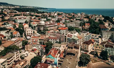 an aerial view of a city with buildings at Cozy 1-bedroom apartment 5 min from the beach in Varna City