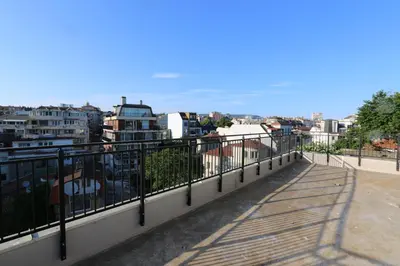 a balcony with a view of a city at Panoramic Penthouse Apartment in Varna City