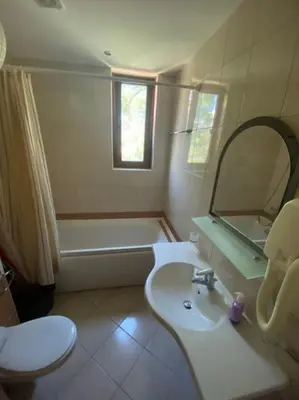 a bathroom with a sink and a bath tub at Central Beach Apartament in Sunny Beach