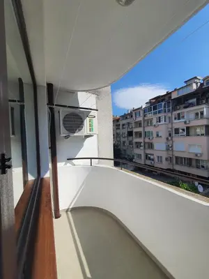 a balcony with a view of a building at Apartament Lazur 13 in Burgas City
