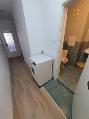 a bathroom with a sink and a toilet at Apartament Lazur 13 in Burgas City