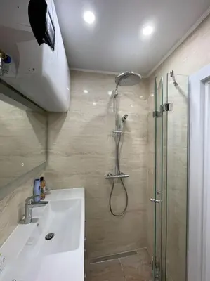 a bathroom with a shower and a sink at Comfy home 2 - Burgas Centre in Burgas City