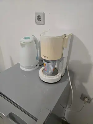a white mixer sitting on top of a counter at POMORIE Blue Bay in Pomorie