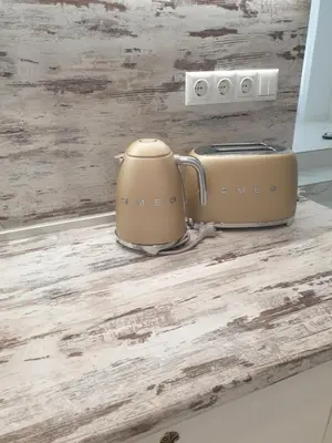 a tea kettle and toaster sitting on a counter at BOHO CHIC STUDIO Free parking upon request in Varna City